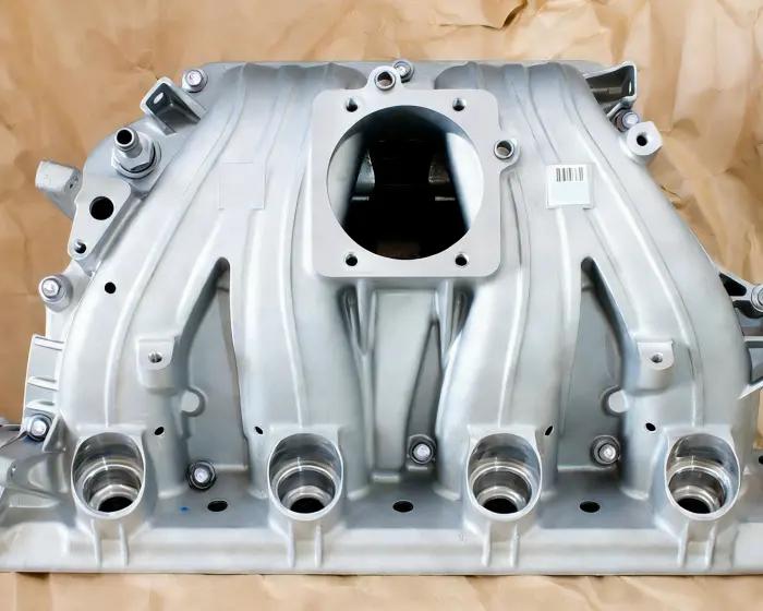 Inserti per stampi a iniezione per collettori di motori automobilistici